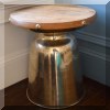 F13. Contemporary round side table with metal base. 